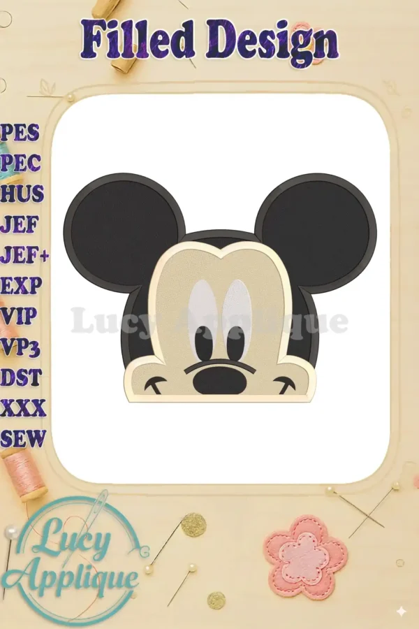 A filled Mickey Mouse head embroidery design in beige and black, ready to be stitched. The design is shown on a white background with a decorative border.