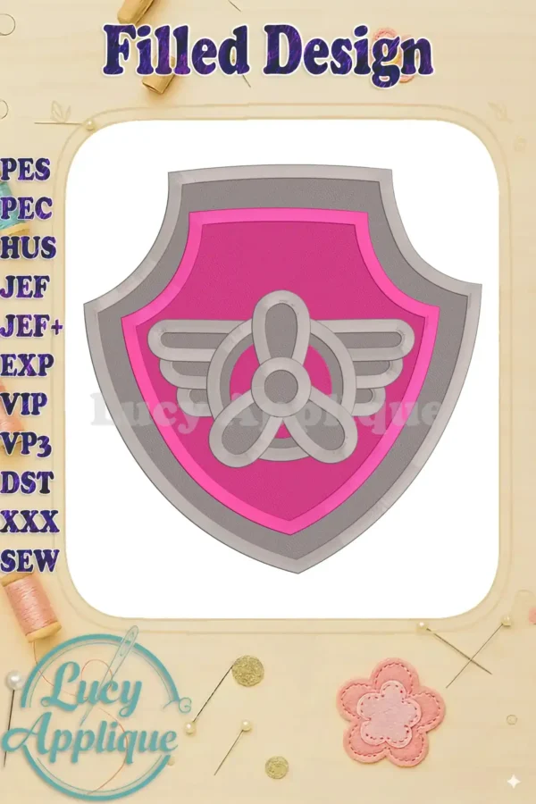Embroidery design of Skye's logo from Paw Patrol. Features a pink and grey shield with wings and propeller. Filled stitch design, perfect for machine embroidery.