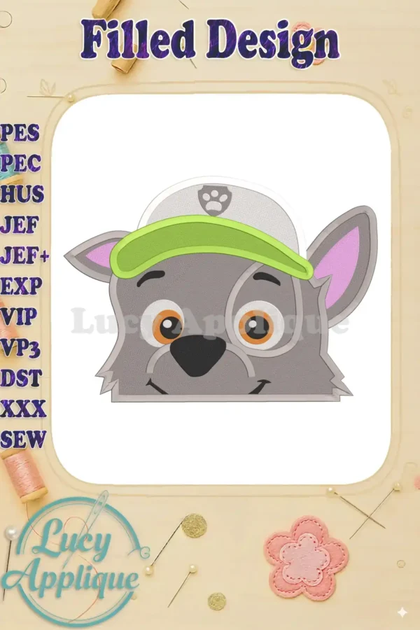 Embroidery design of Rocky from Paw Patrol wearing a green cap. The design is in filled format, suitable for machine embroidery. It showcases a cute, cartoonish style.