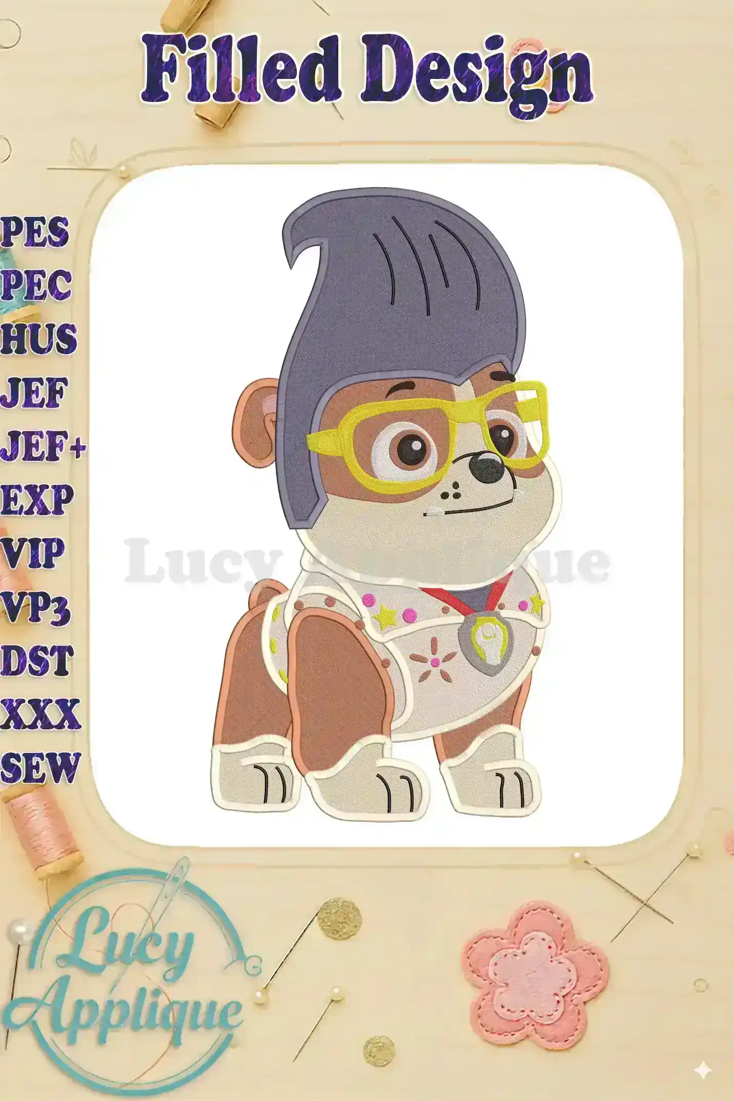 Embroidery design of Rubble from Paw Patrol dressed in a Halloween costume. The design is detailed and features multiple colors. Perfect for Halloween projects.