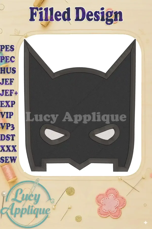 A filled machine embroidery design of Batman's head, suitable for various projects. The design features sharp lines and a dark color scheme, ideal for creating a striking visual effect.