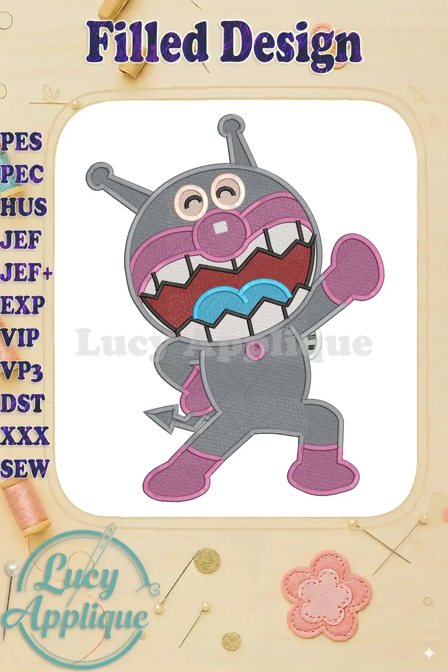 Vibrant Anpanman Chapon's Hero fill embroidery of a grey, pink, and blue character with sharp teeth and antennas.