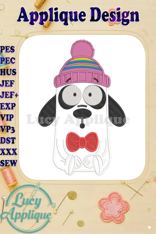 Sa'doon from Masameer Junior applique design, a cheerful dog-like character in a pink beanie and red bow tie.