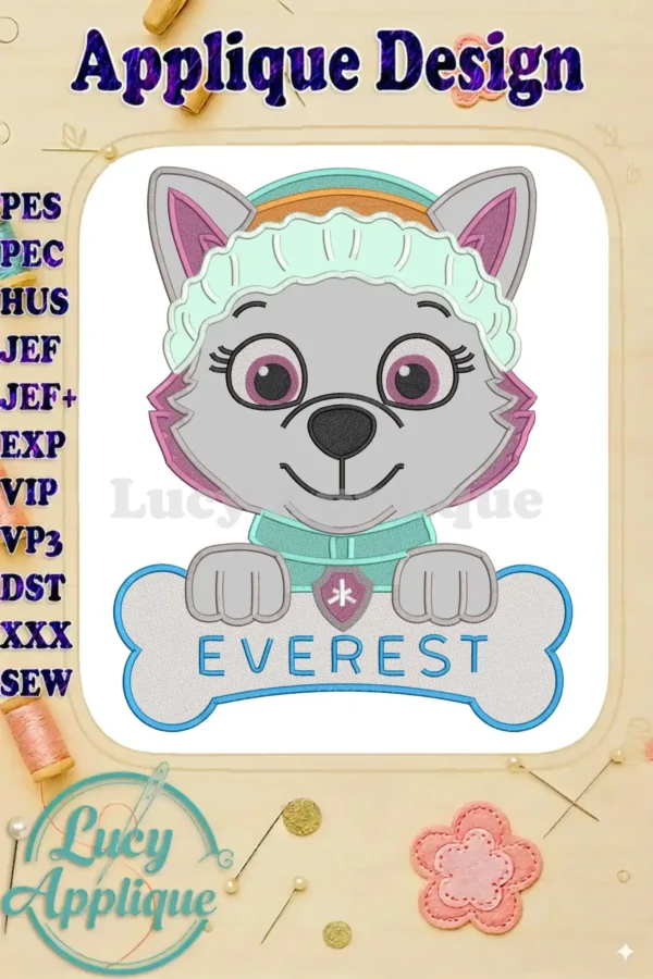 Detailed applique embroidery of Everest from Paw Patrol, smiling with a winter hat and holding an 'EVEREST' bone.